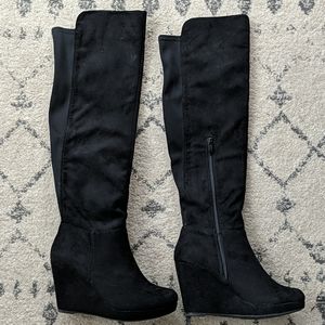 Knee high black wedge boots